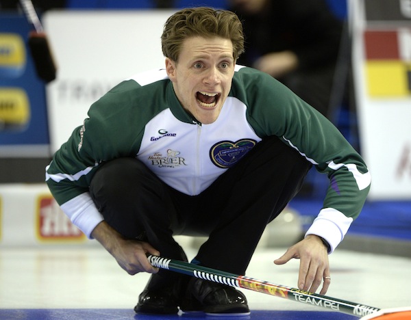 PEI skip Adam Casey yells during a draw against BC at the Tim Hortons Brier in Ottawa Saturday March 5, 2016. THE CANADIAN PRESS/Justin Tang