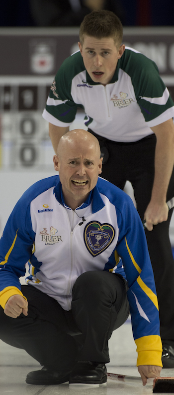 Ottawa Ont.Mar 6, 2016.Tim Hortons Brier.Alberta skip Kevin Koe, P.E.I. lead Robbie Doherty, second Anson Carmody, Curling Canada/ michael burns photo